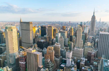 Aerial view of midtown Manhattan’s skyline at sunset, representing New York City’s professional landscape and executive assistant staffing industry.