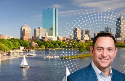 Beacon Hill (BHSG) leader featured alongside Boston skyline and waterfront