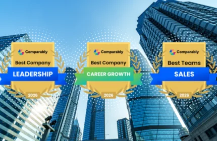 Cityscape in Boston sits in the background while the three Comparably awards for Beacon Hill's Leadership, Career Growth Leadership and Sales Excellence
