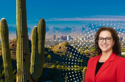 Stacy Boase, Division Director of Beacon Hill Financial in Phoenix, pictured against the Phoenix, Arizona skyline and Sonoran Desert landscape.