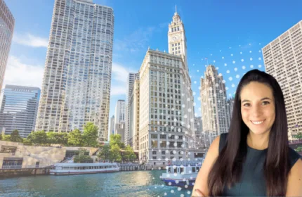 Kathleen Parhas pictured in front of the Chicago River and downtown Chicago skyline, recognizing her promotion to Division Director at Beacon Hill Associates.