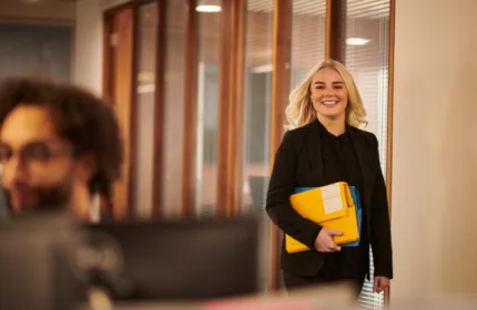 Legal professional walks into a room, reflecting that Beacon Hill Solutions Group ranked #9 nationally among SIA’s 2026 Largest Legal Staffing Firms.