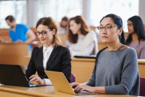 Adobe Stock 257393498 Multinational group of students in an auditorium