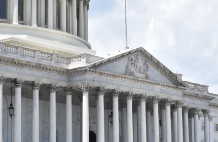 The U.S. Capitol building, representing staffing and consulting support for federal agencies.