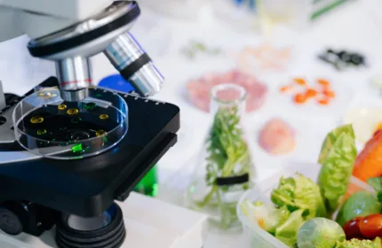 A person preparing food samples, representing financial oversight for food science operations.