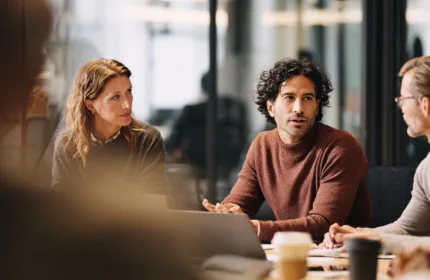 Technology consultants collaborating on enterprise IT solutions, symbilizing the technology services from BH Technologies.