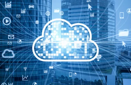 Cloud computing icon overlaid on a modern city skyline with digital data and technology symbols.