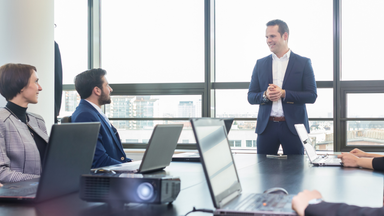 Business professionals working on corporate accounting tasks.
