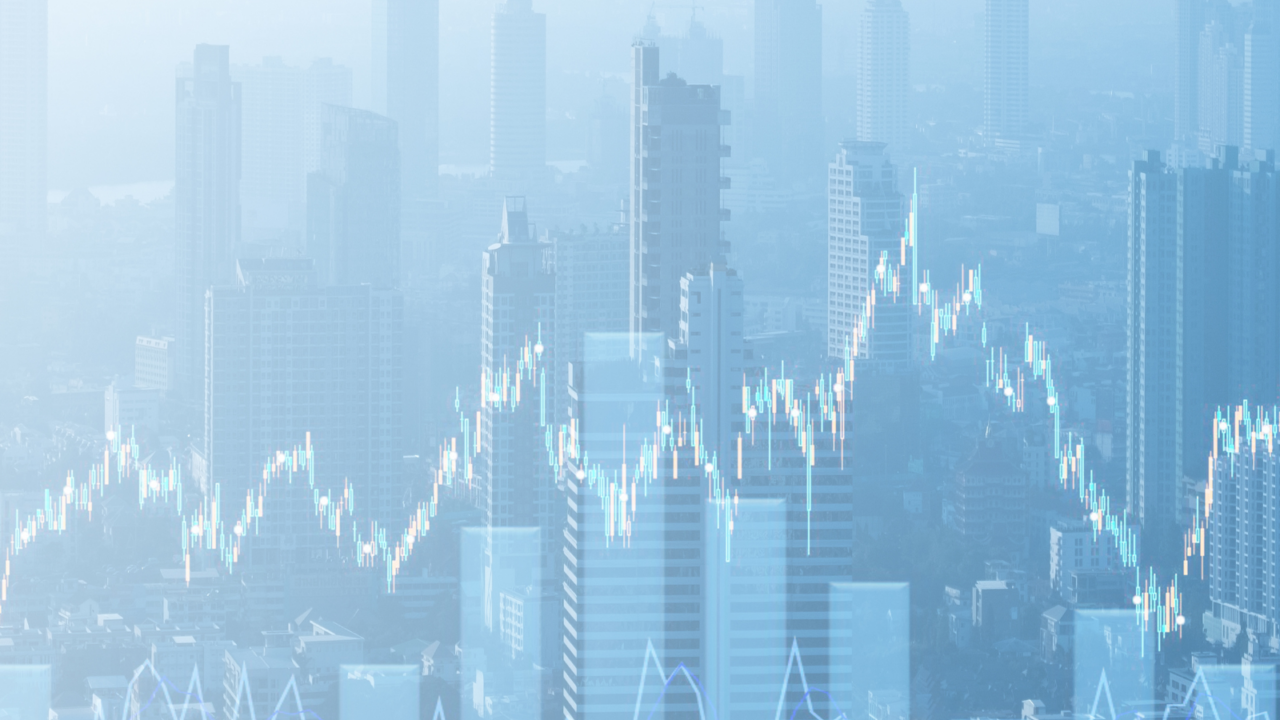 City skyline overlaid with financial graphs and data charts symbolizing finance and accounting optimization through analytics and performance improvement.