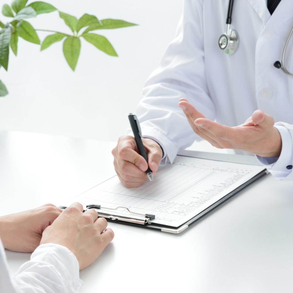 Medical professional consulting with patient