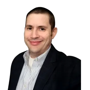 headshot of Aaron Sutton