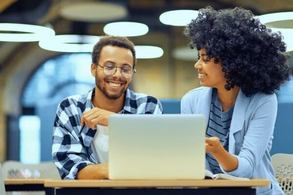 Business professionals reviewing contingent workforce strategy, representing OneBeacon’s MSP solutions that enhance visibility, governance, and cost savings.