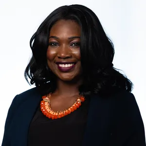 headshot of Ene Idoko