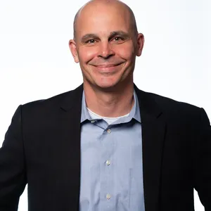 headshot of Travis Reding