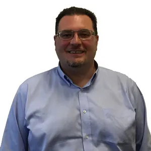 headshot of Tom Mello