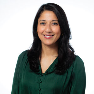 headshot of Neha Menon