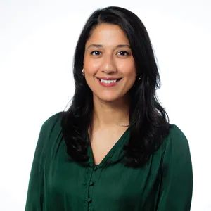 headshot of Neha Menon